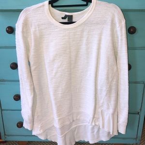 Left of center asymmetrical bottom tee